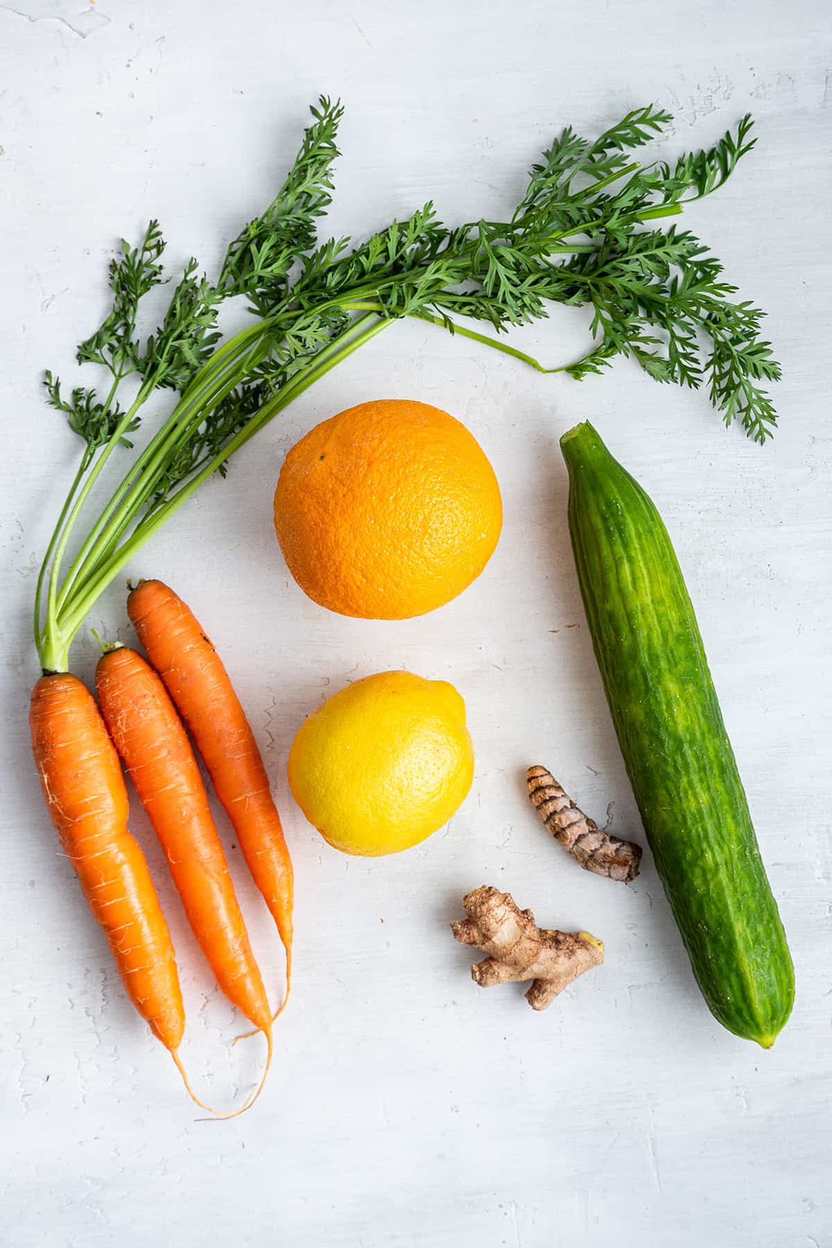 Overhead view of ingredients for carrot juice
