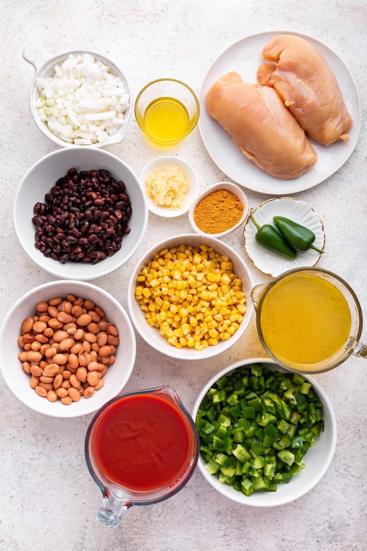 Overhead view of ingredients for chicken taco soup