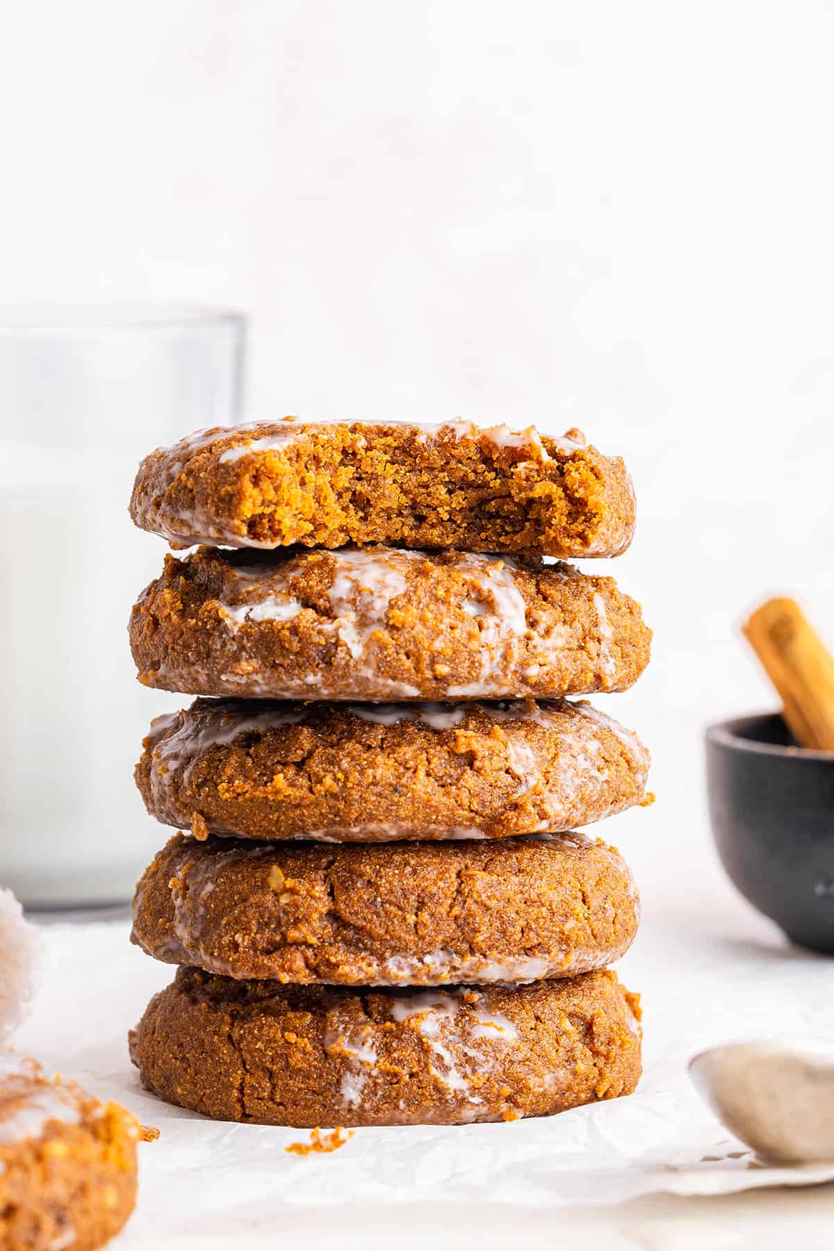 Stack of 5 healthy pumpkin cookies, with bite taken out of top cookie