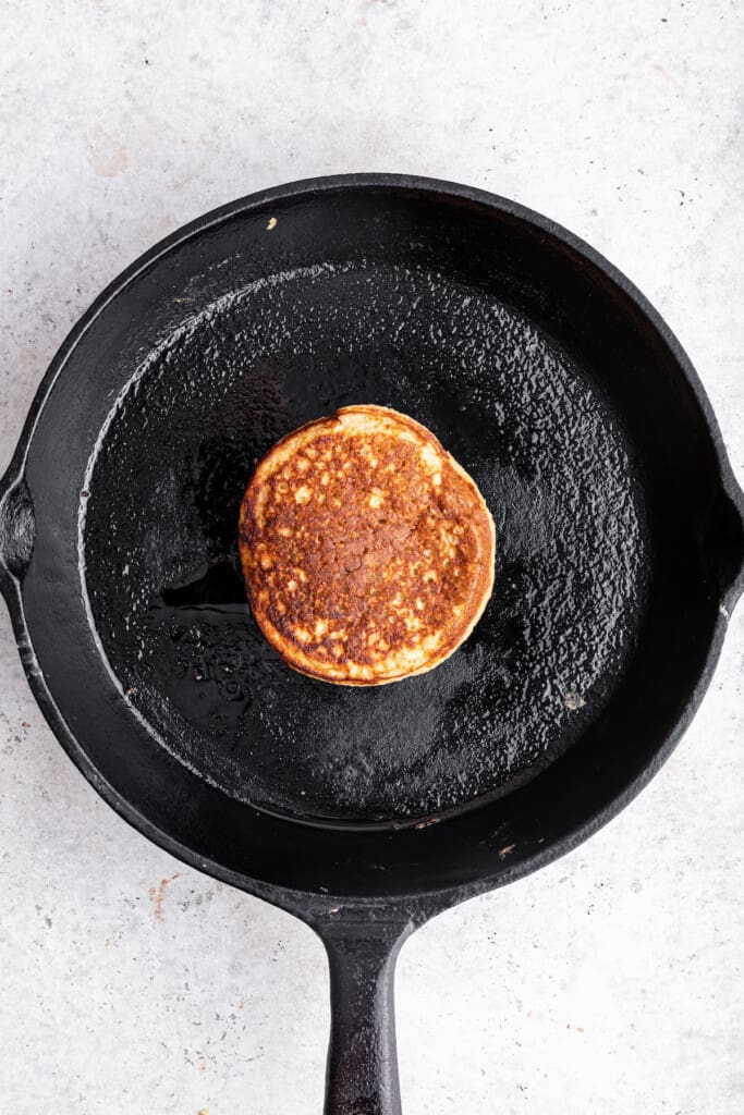 Overhead view of pancake in cast iron skillet