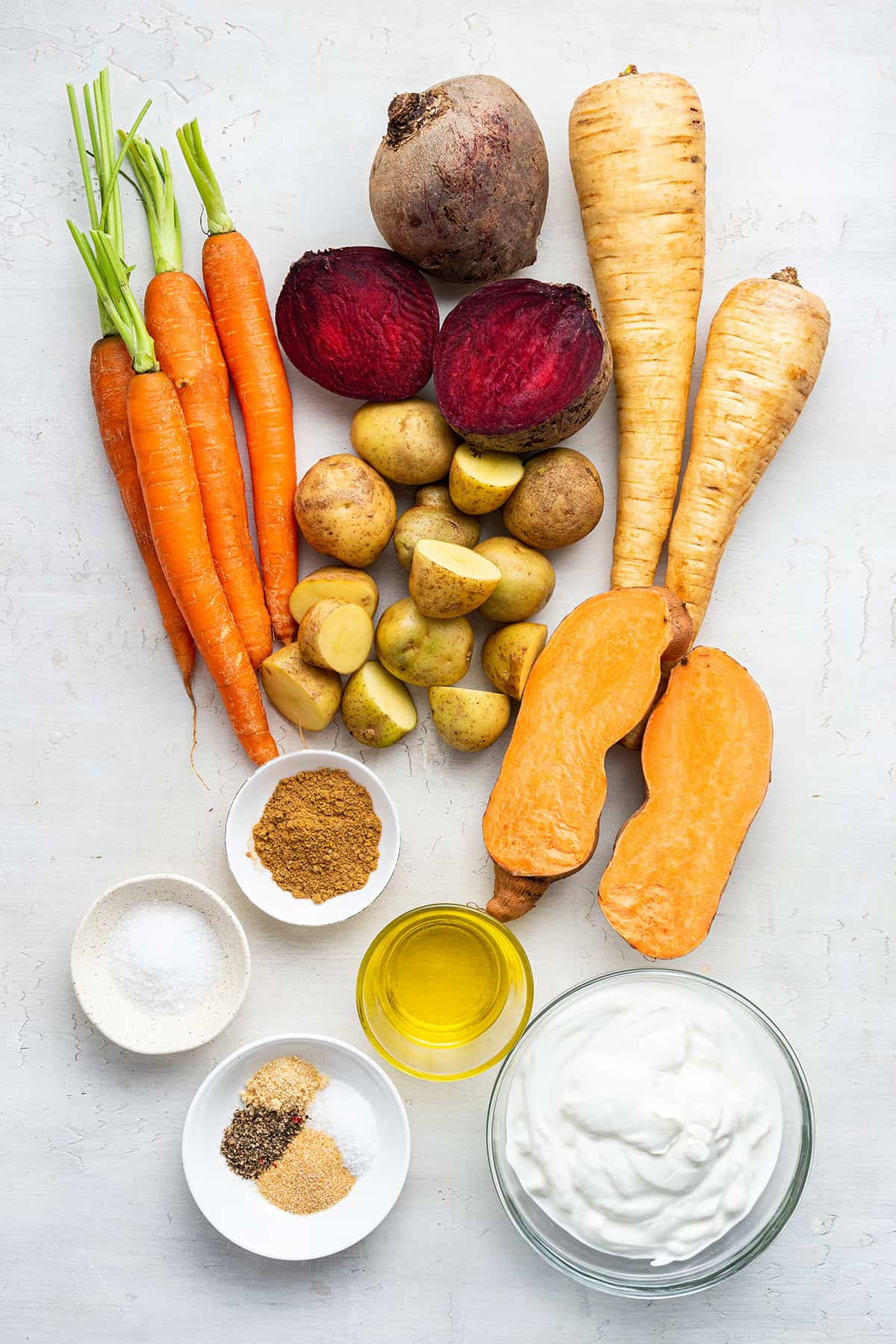 Overhead view of ingredients for oven-roasted root vegetables