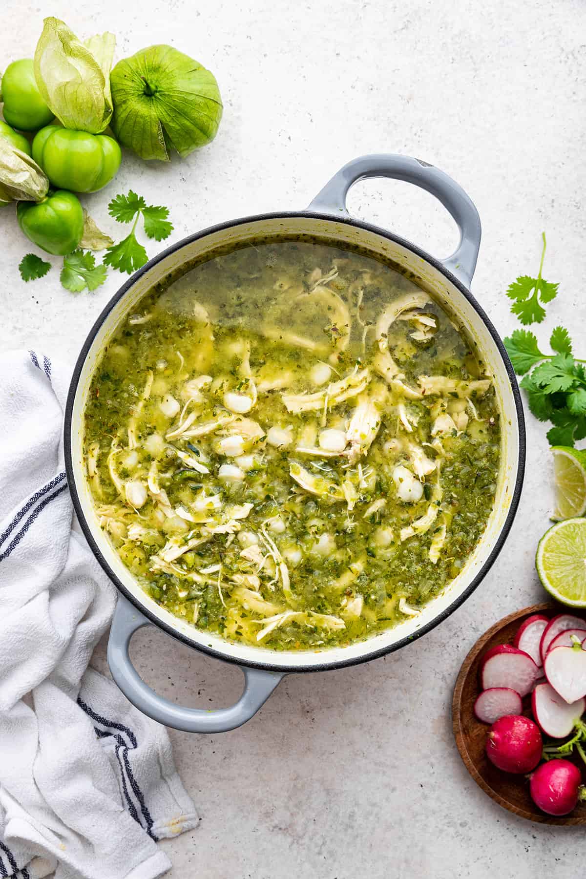 Cooked pozole verde in enamel cast iron Dutch oven