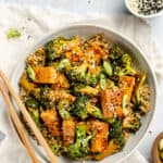 Tofu and broccoli stir fry with quinoa and soy sauce