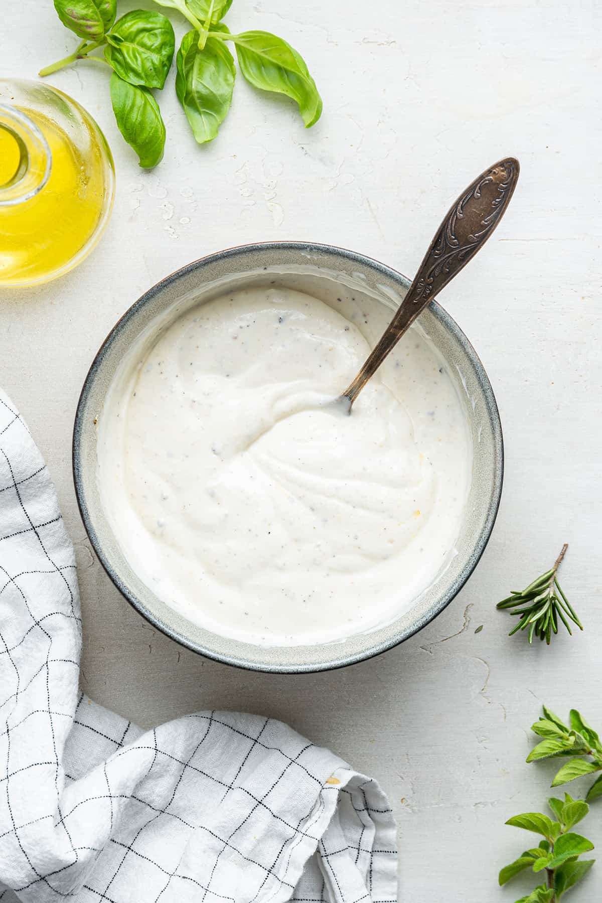 Overhead view of Greek yogurt dip in bowl with spoon