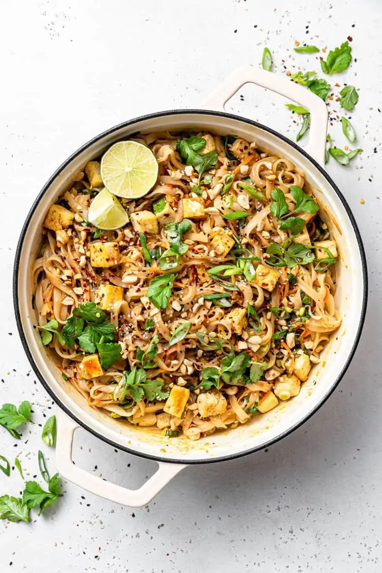 pot of pad thai with tofu and herbs