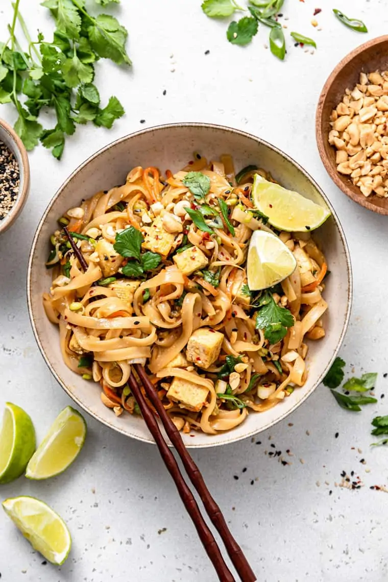 bowl of pad thai with tofu and rice noodles