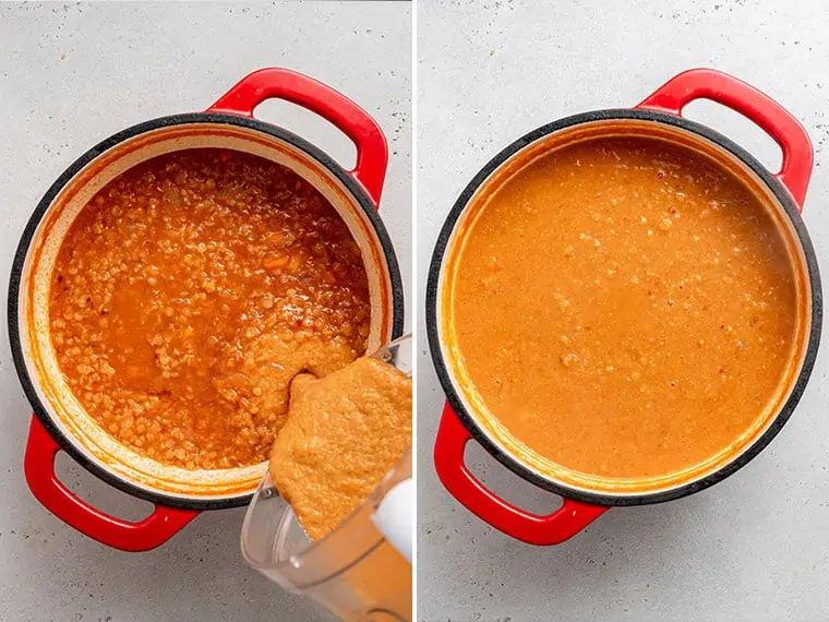 pouring blender contents into a pot of creamy red lentils soup