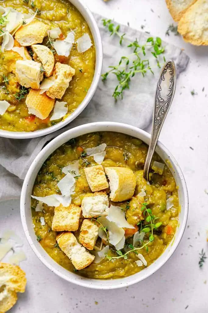 bowl of split pea soup with croutons